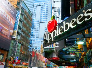 An Applebee's sign in New York City's Times Square.